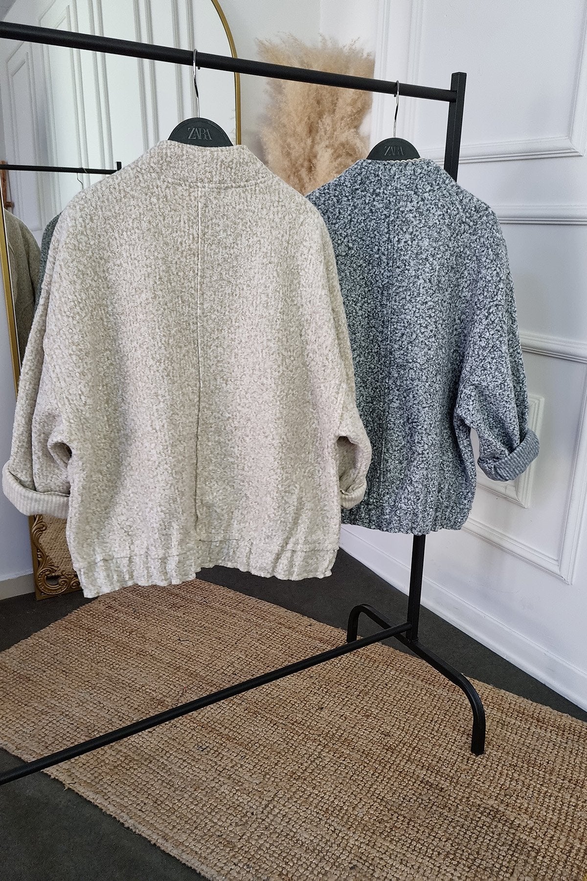 Veste oversize en bouclette à boutons-pression sur le devant