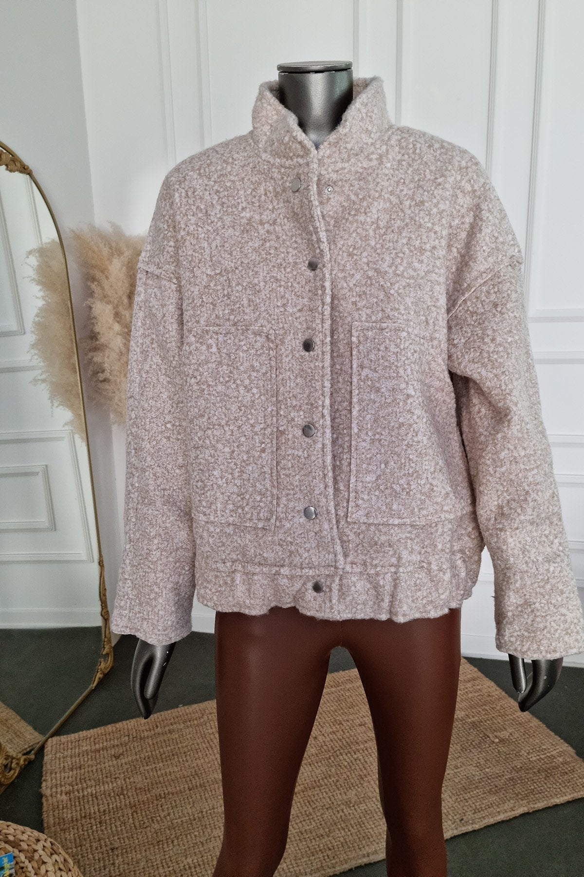 Veste oversize en bouclette à boutons-pression sur le devant