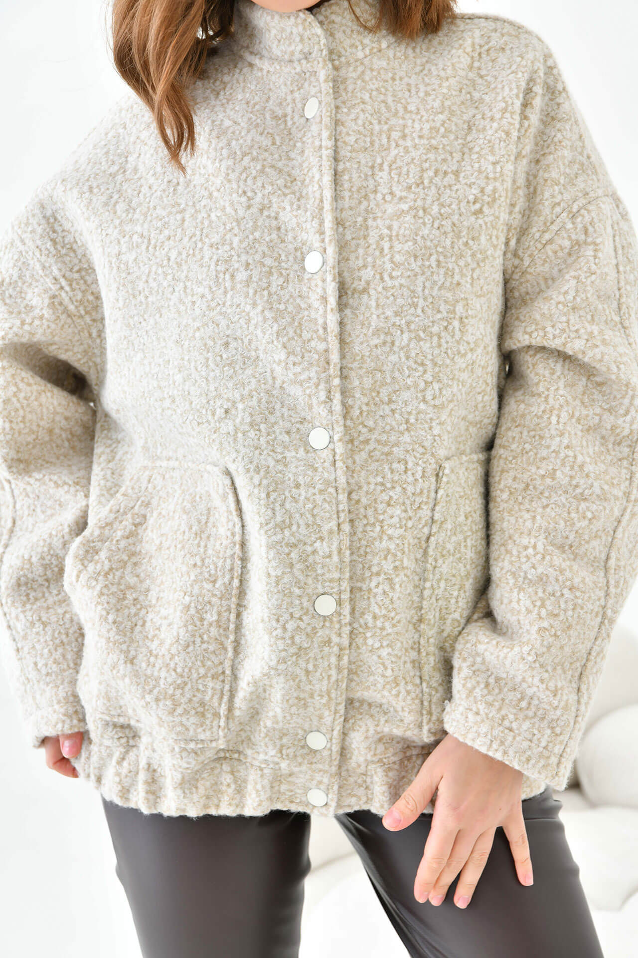 Veste oversize en bouclette à boutons-pression sur le devant