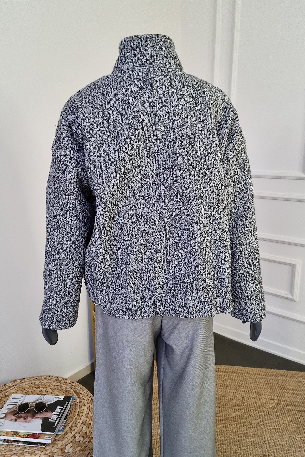 Veste oversize en bouclette à boutons-pression sur le devant